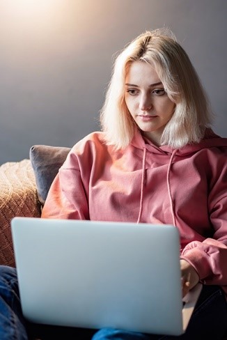 Student in her computer