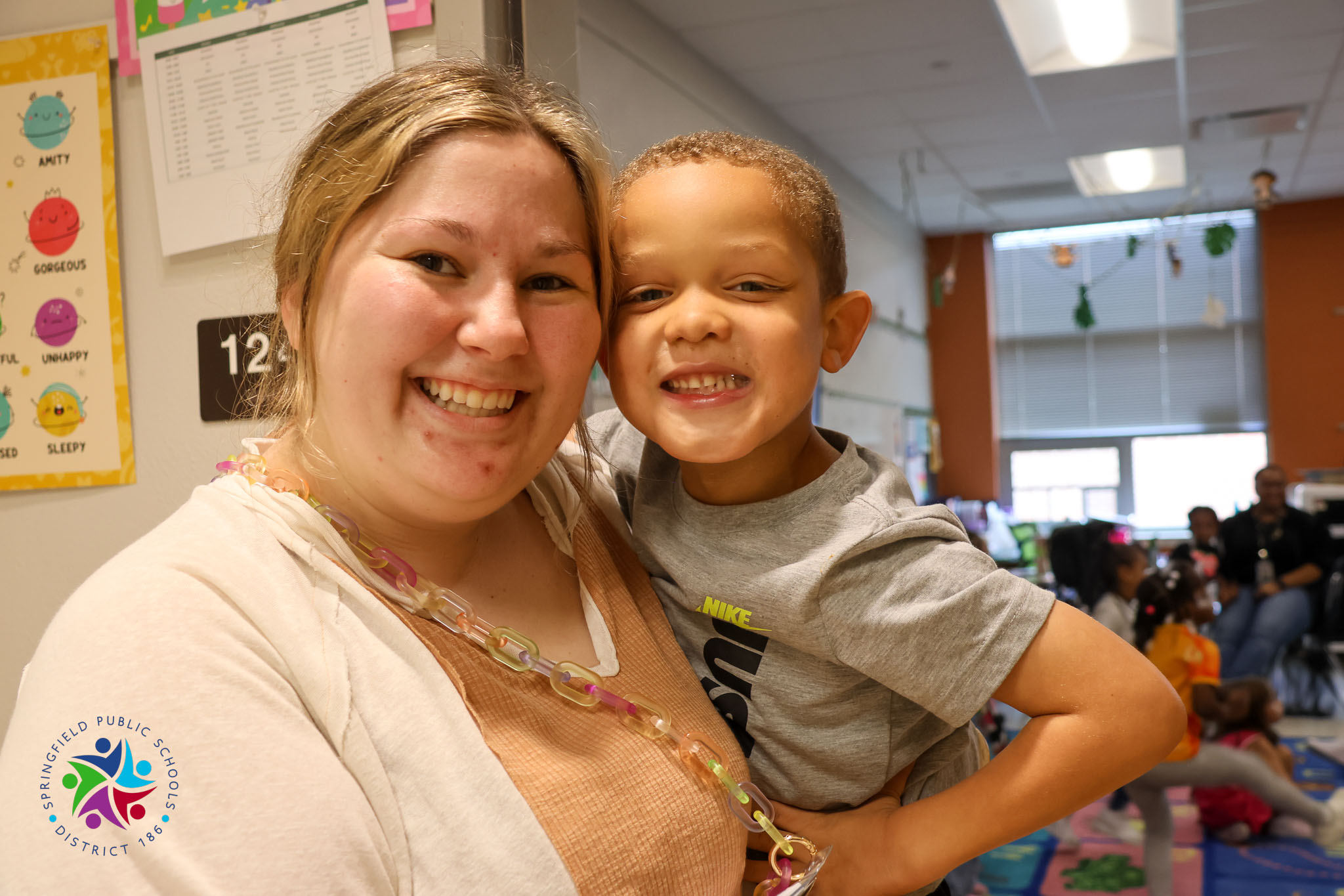 all smiles with student and teacher