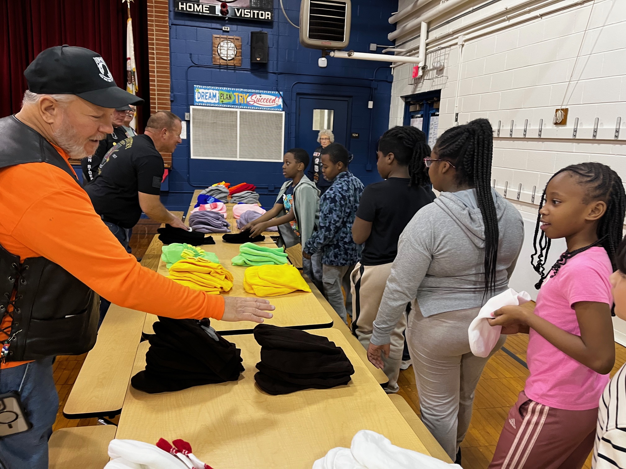 Kids getting free hats