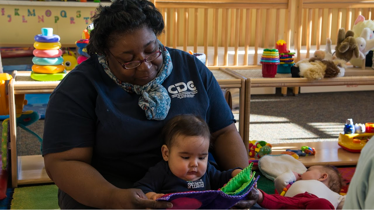 Woman and a baby playing