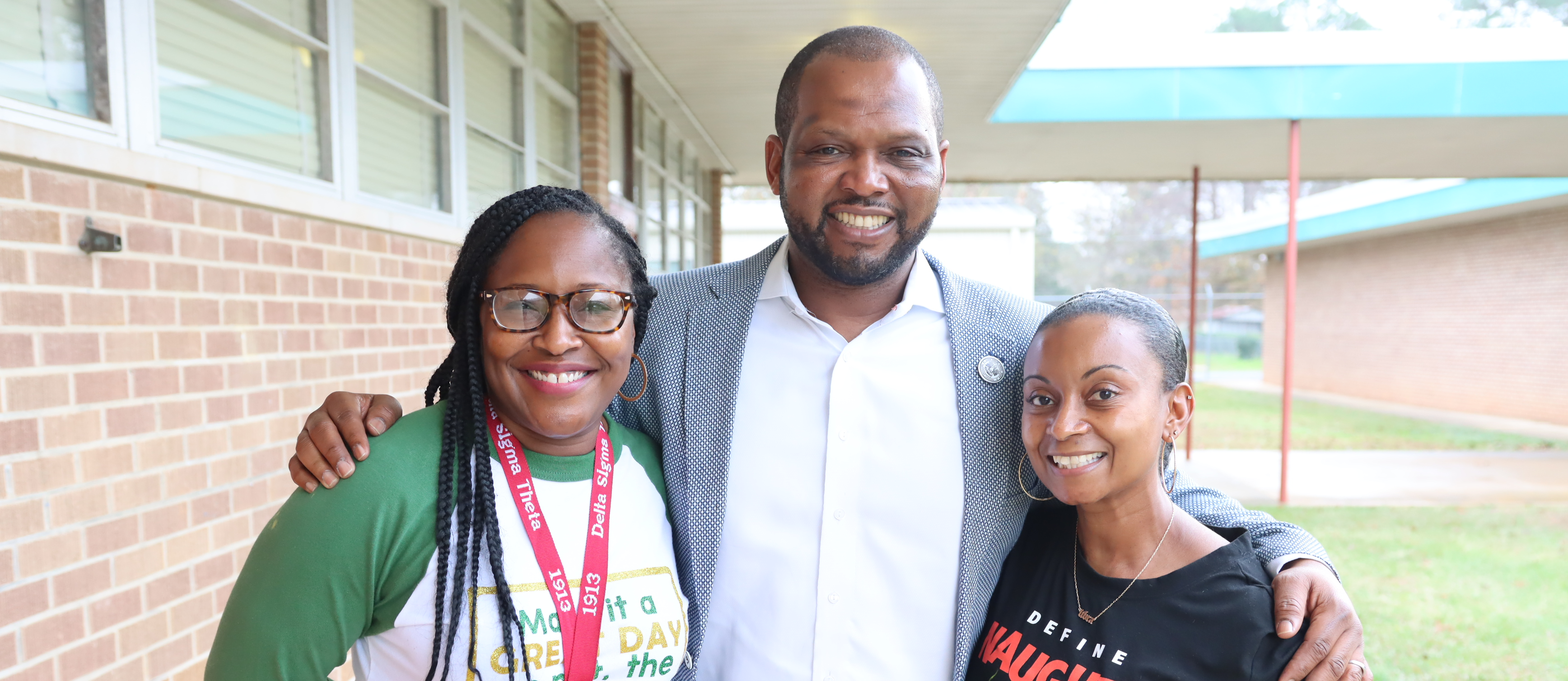 school leaders smiling