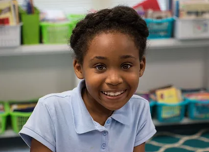 Young student smiling at camera