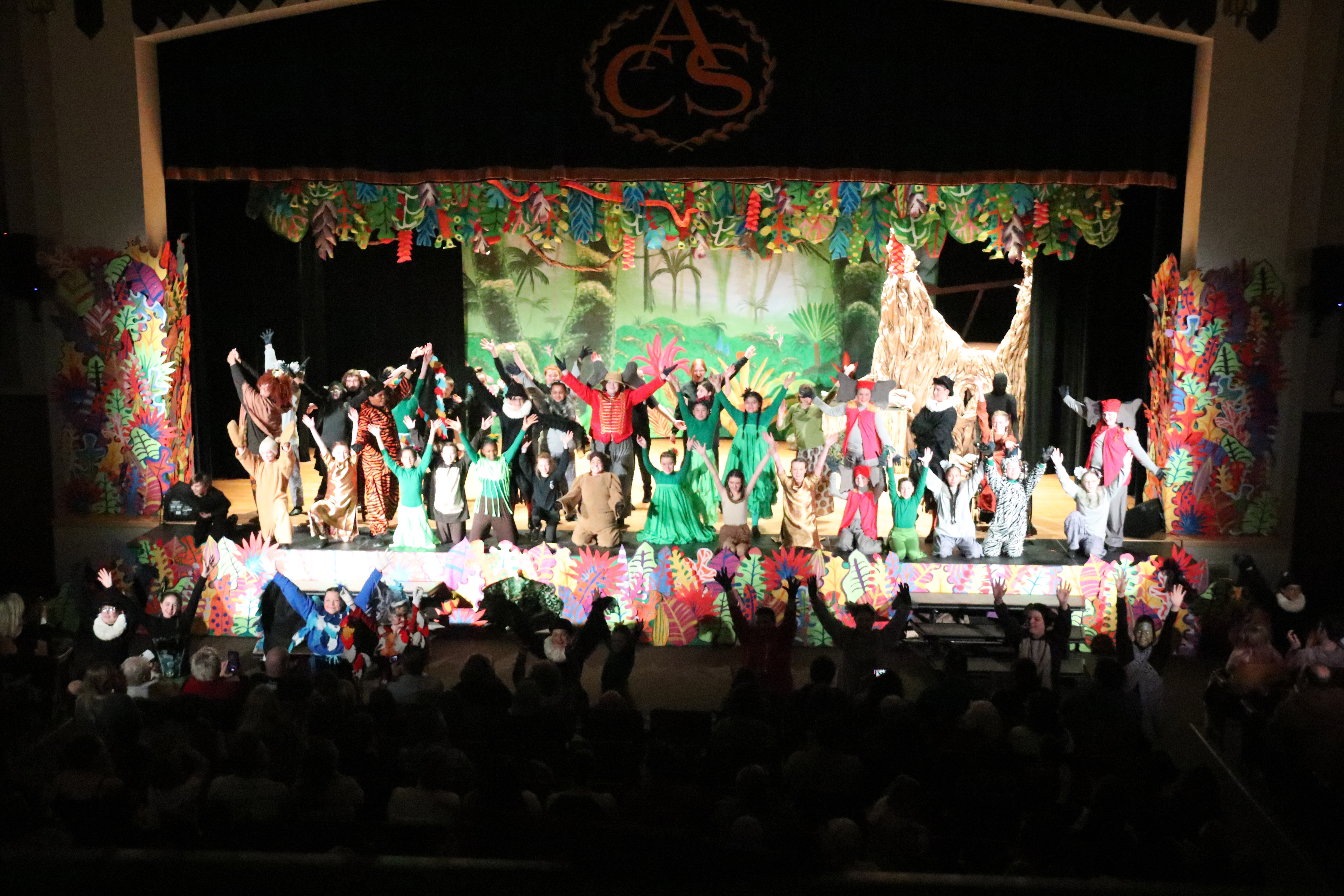 students perform in The Jungle Book