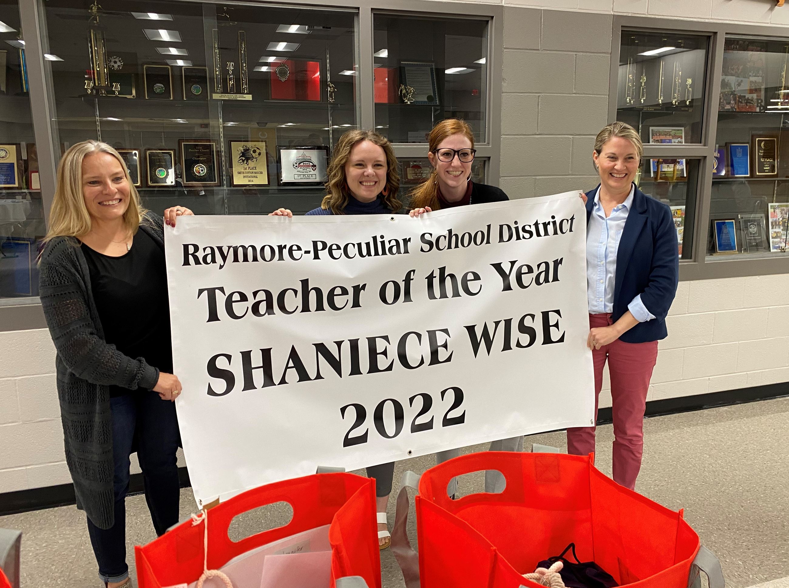 From left to right: 2019 Teacher of the Year Jennifer Vacca, 2022 Teacher of the Year Shaniece Wise, Timber Creek Elementary Principal Dr. Lauren Gechter, and 2011 Support Staff Employee of the Year Allison Scott.