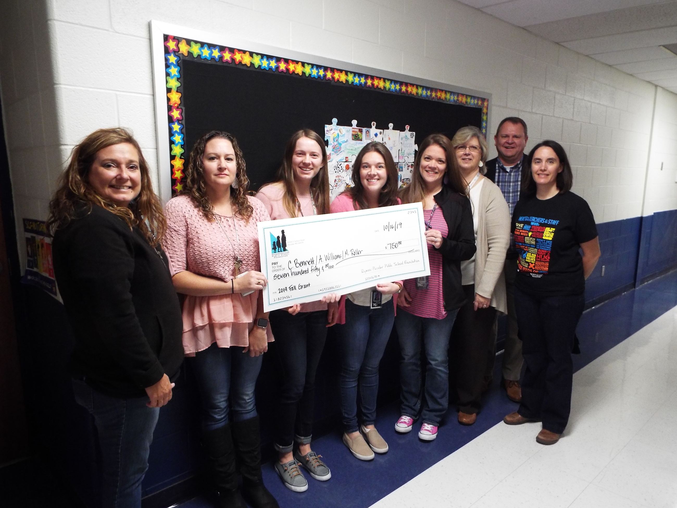 Peculiar Elementary School first grade teachers Colleen Bennett, Alisha Williams, and Monica Roller received a grant of $750 to purchase Bee Bots.
