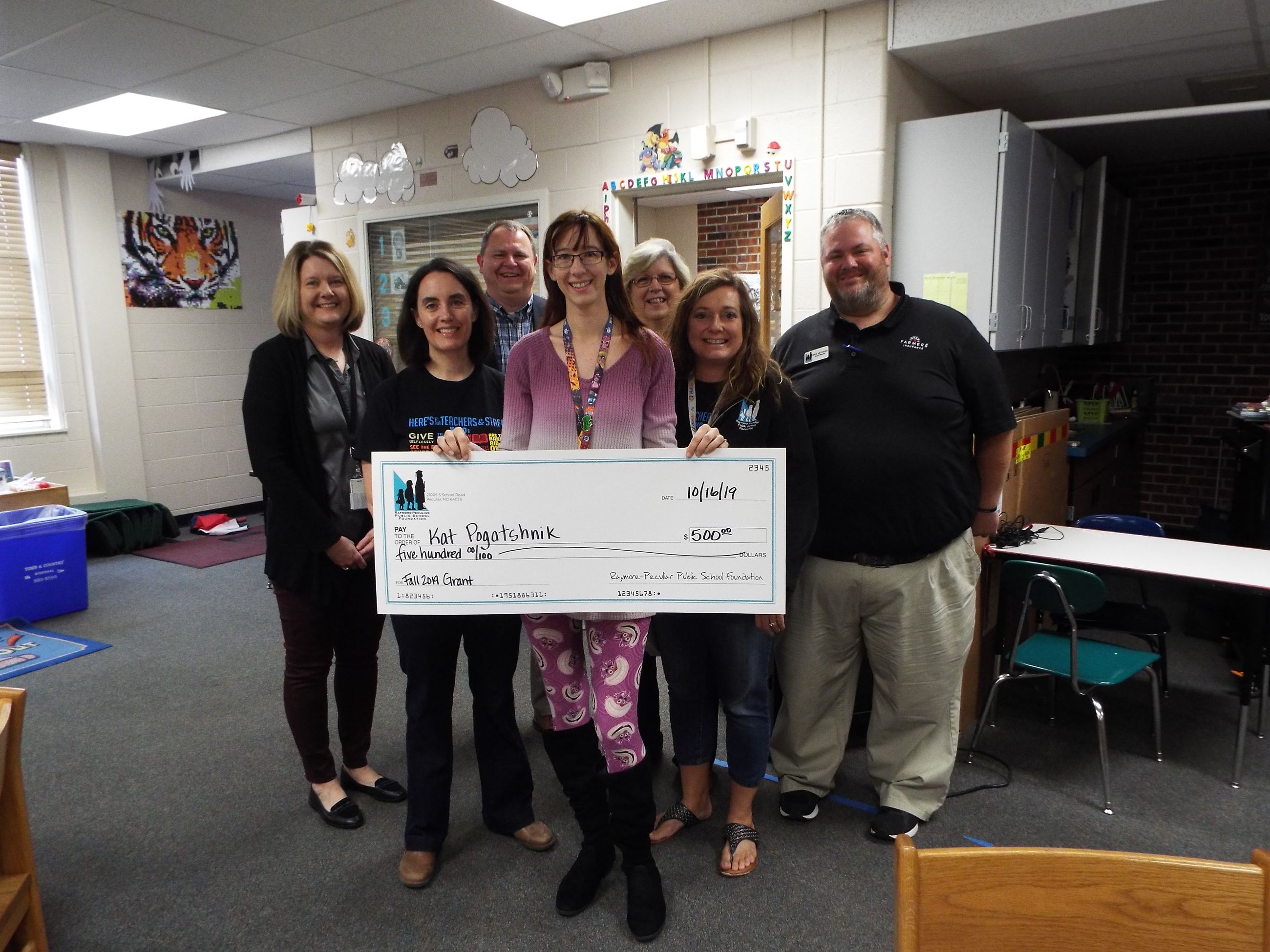 Raymore Elementary Library Media Specialist Kat Pogatshnik received a $500 grant to pay for a visit by a children's book author.