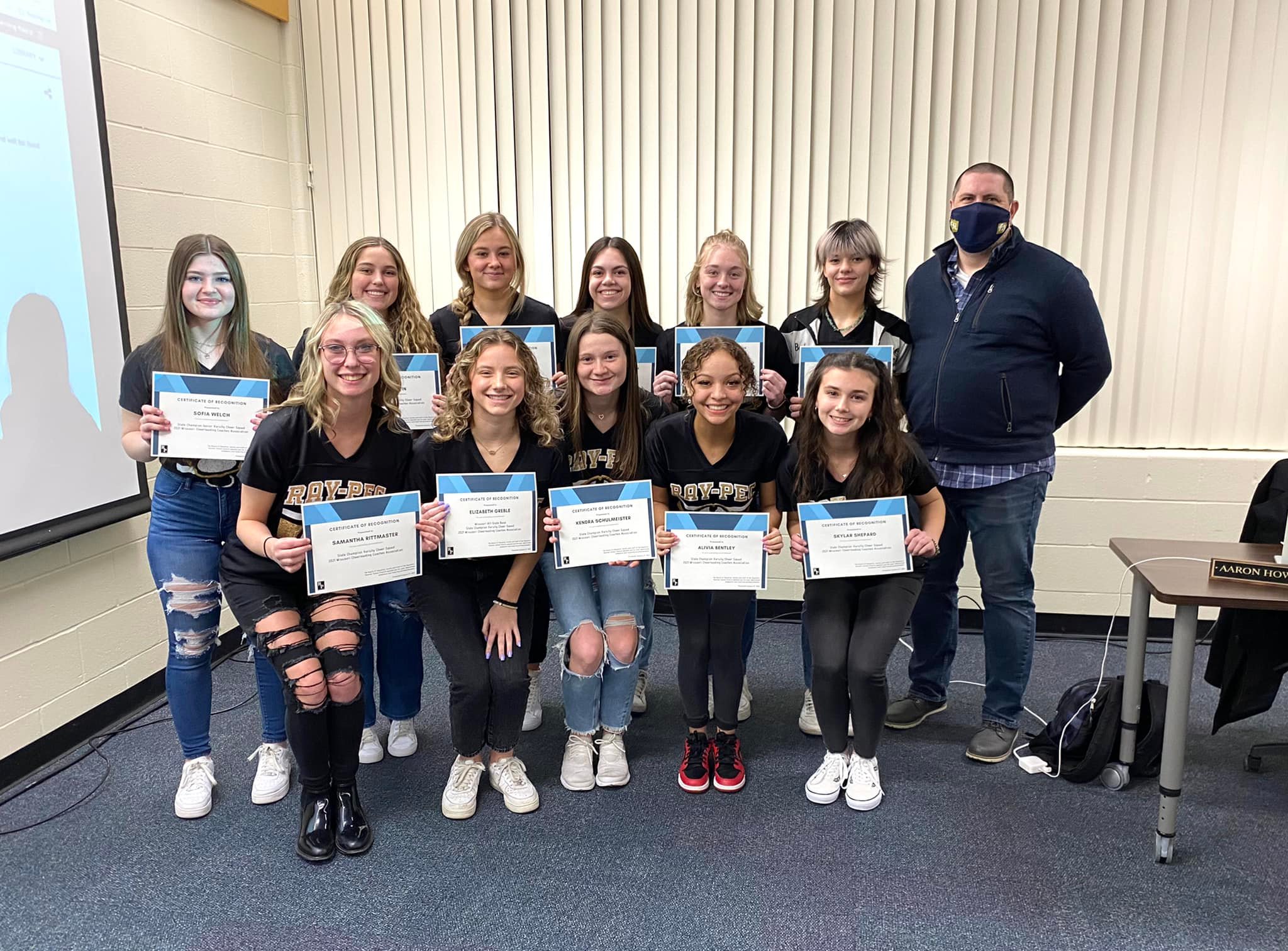 School Board honors cheerleaders