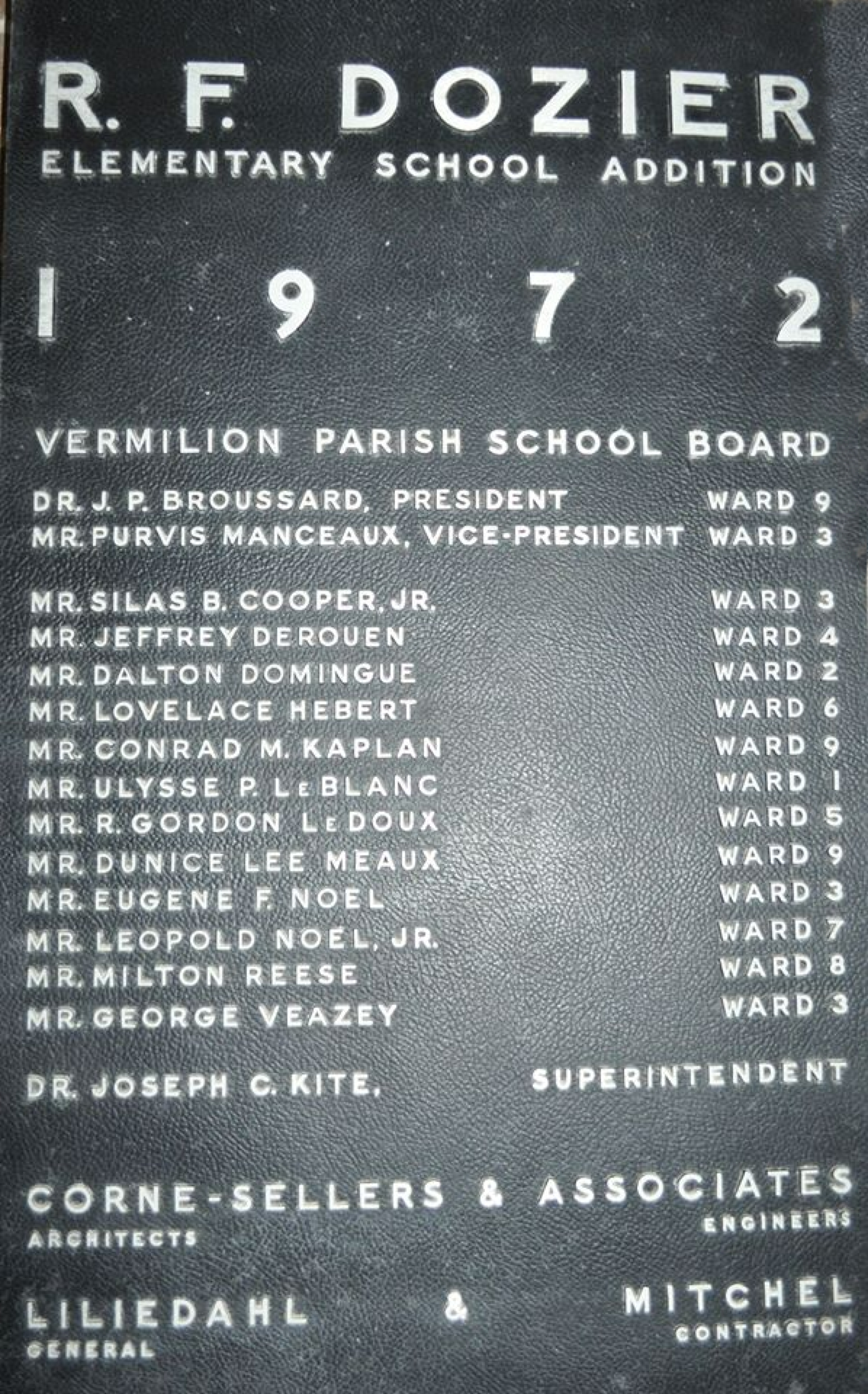 This photo shows the plaque for the 1972 opening of Dozier Elementary.