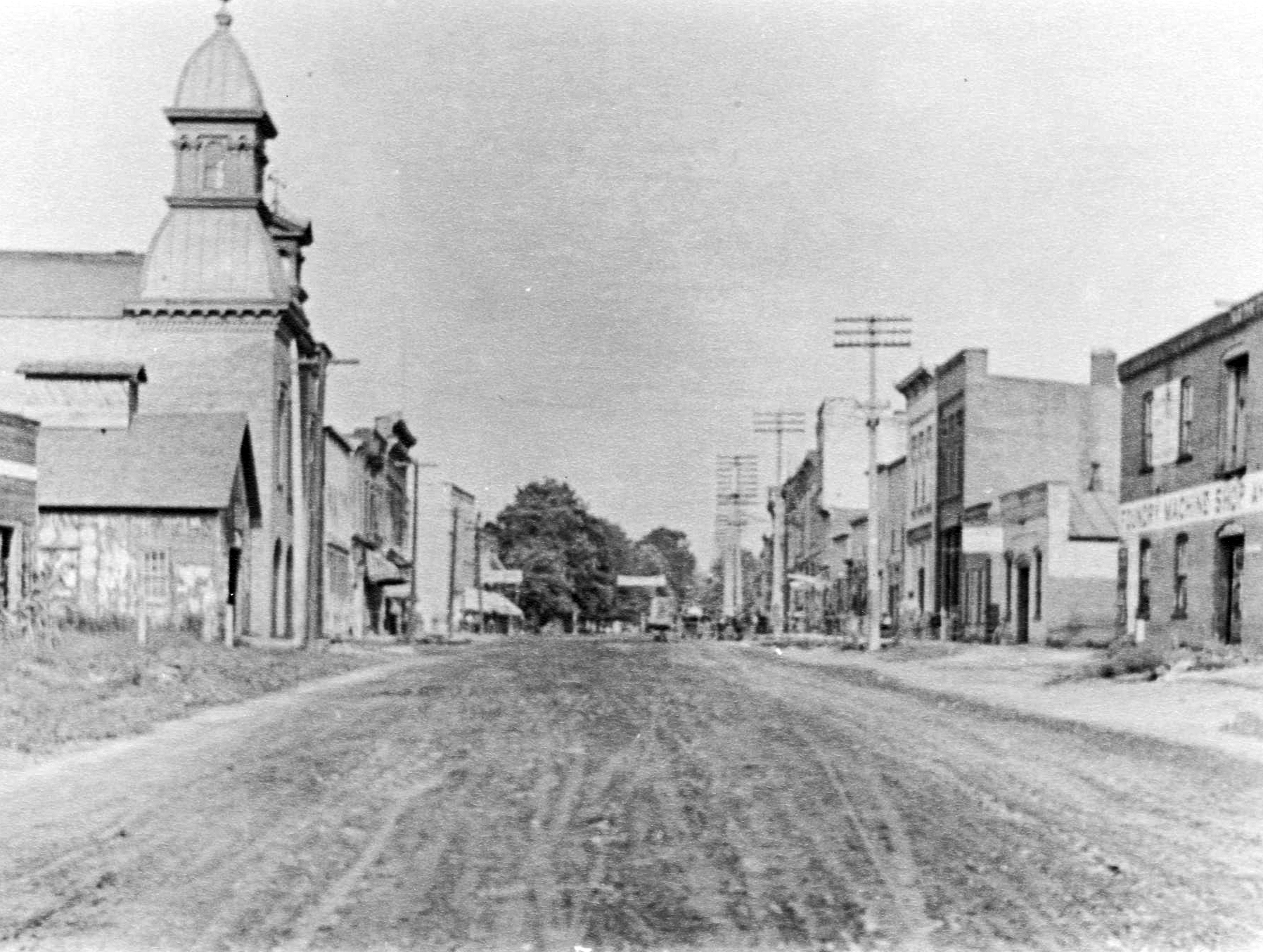 West Main Street, Morenci, Michigan.  Looking east from Foundry corner.  New city hall, with bell tower, on North (left) side.  (1898)