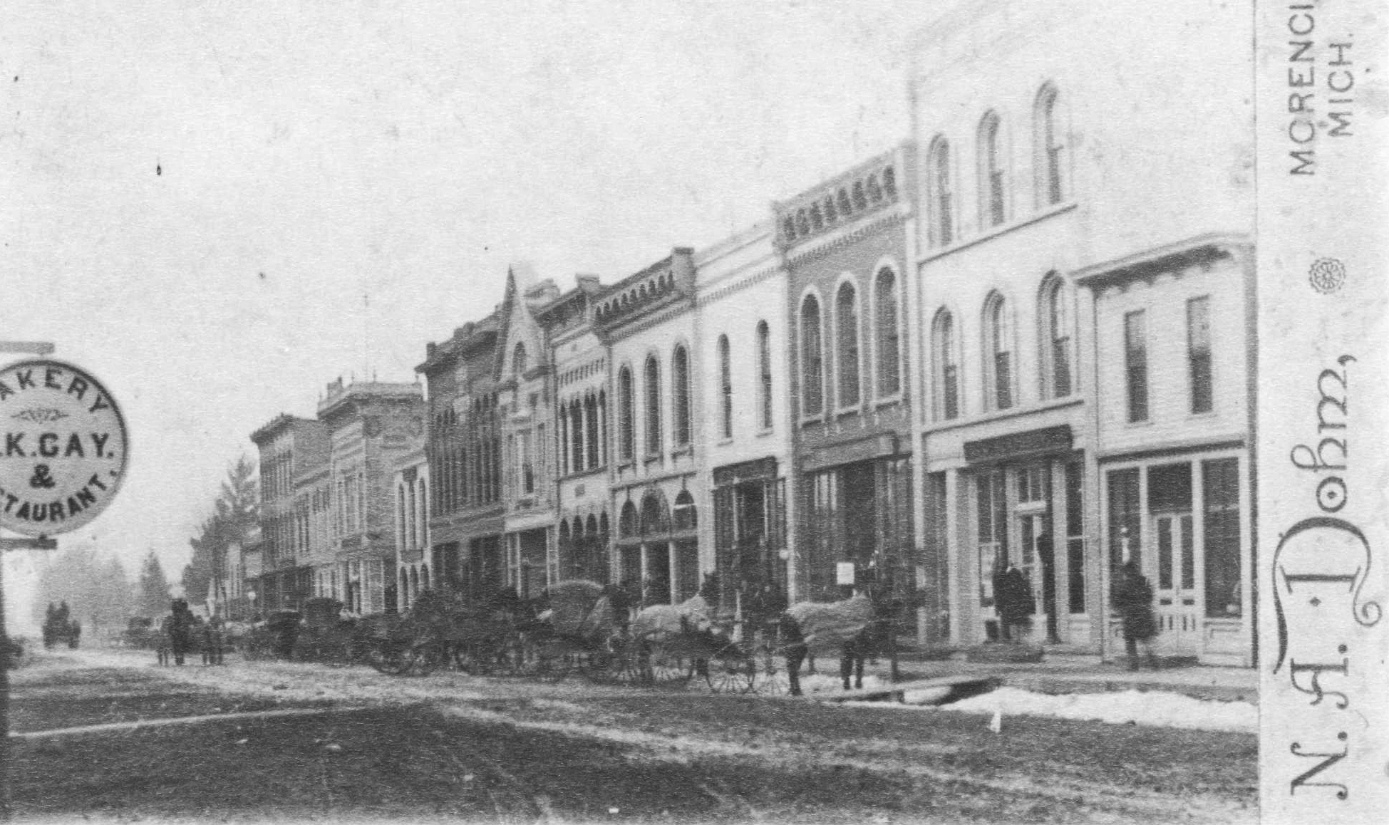 West Main Street, Morenci, Michigan (south side), looking east from L.K. Gay’s bakery.  Prior to 1911 and after 1902.