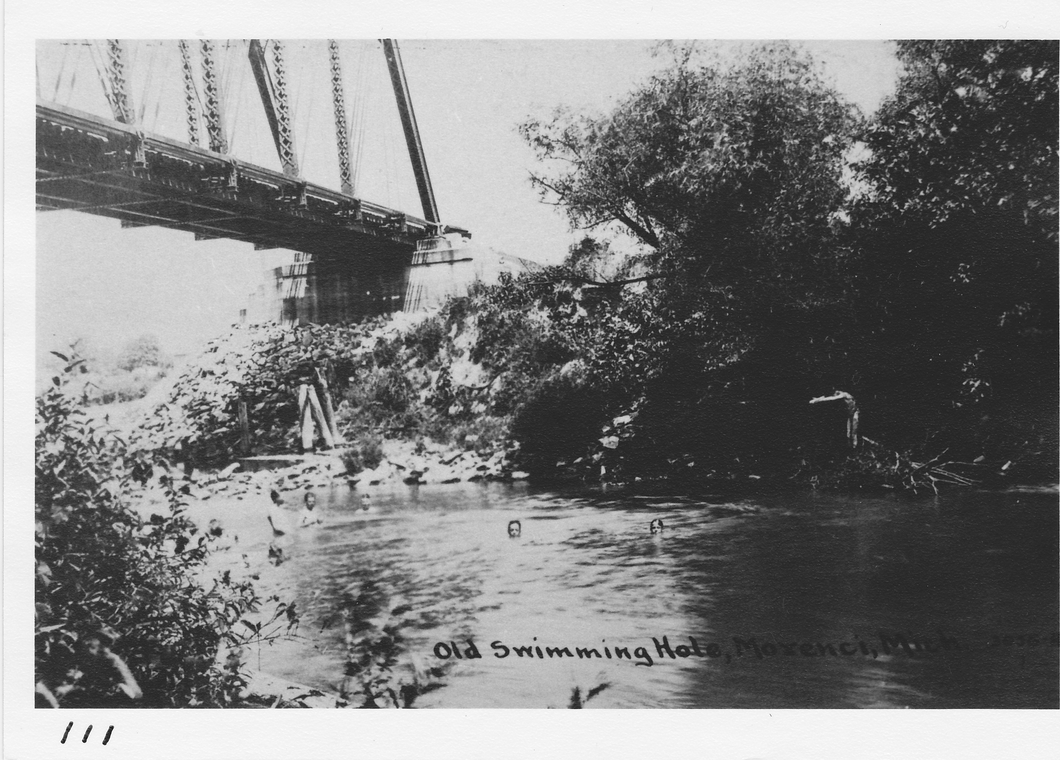The swimming hole under Lake Shore Bridge at foot of W. Congress Street. The concrete bridge supports are still standing.