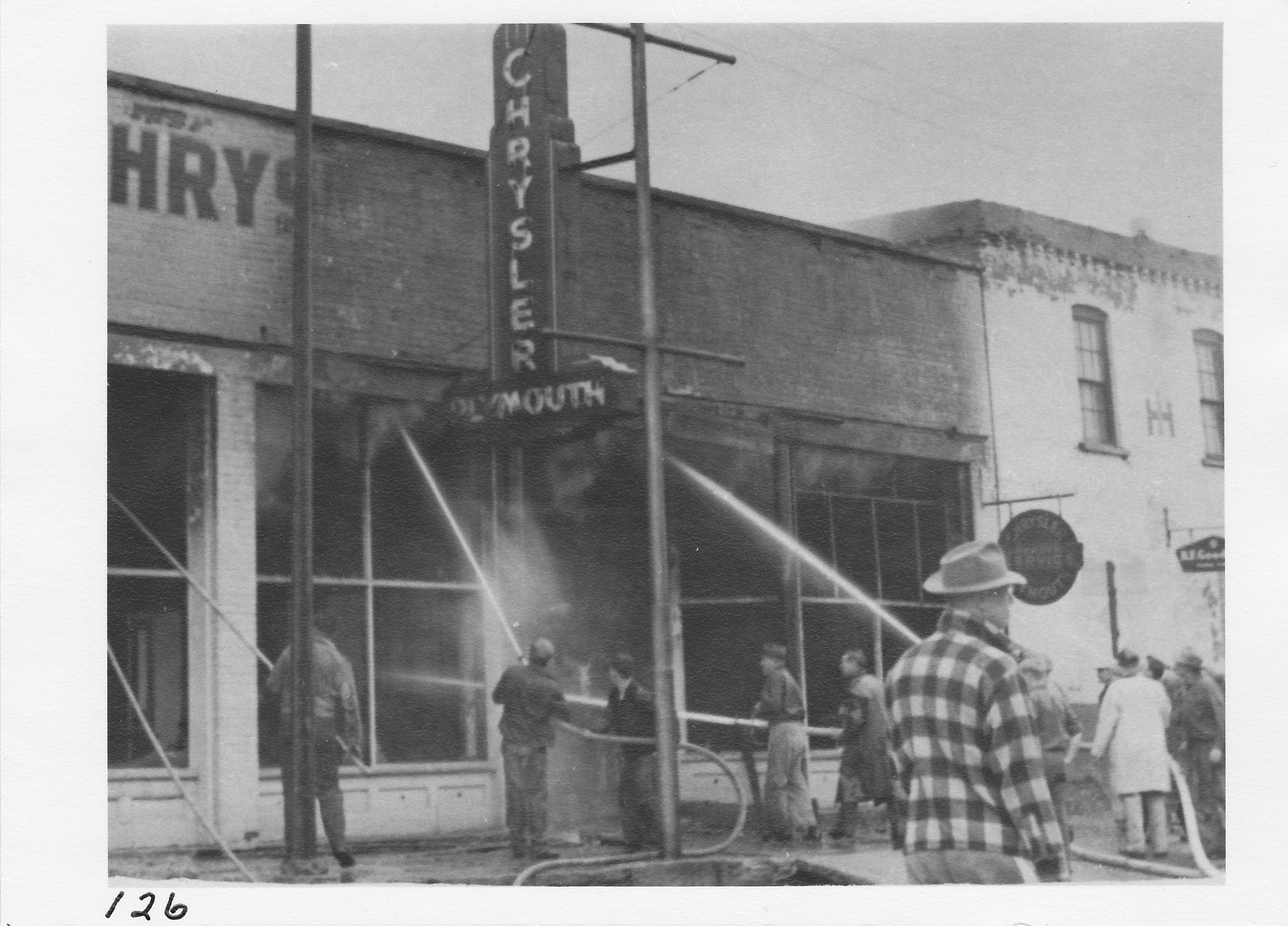 Fire at Tidwell’s Auto Sales and garage on West Main St. April 1952.