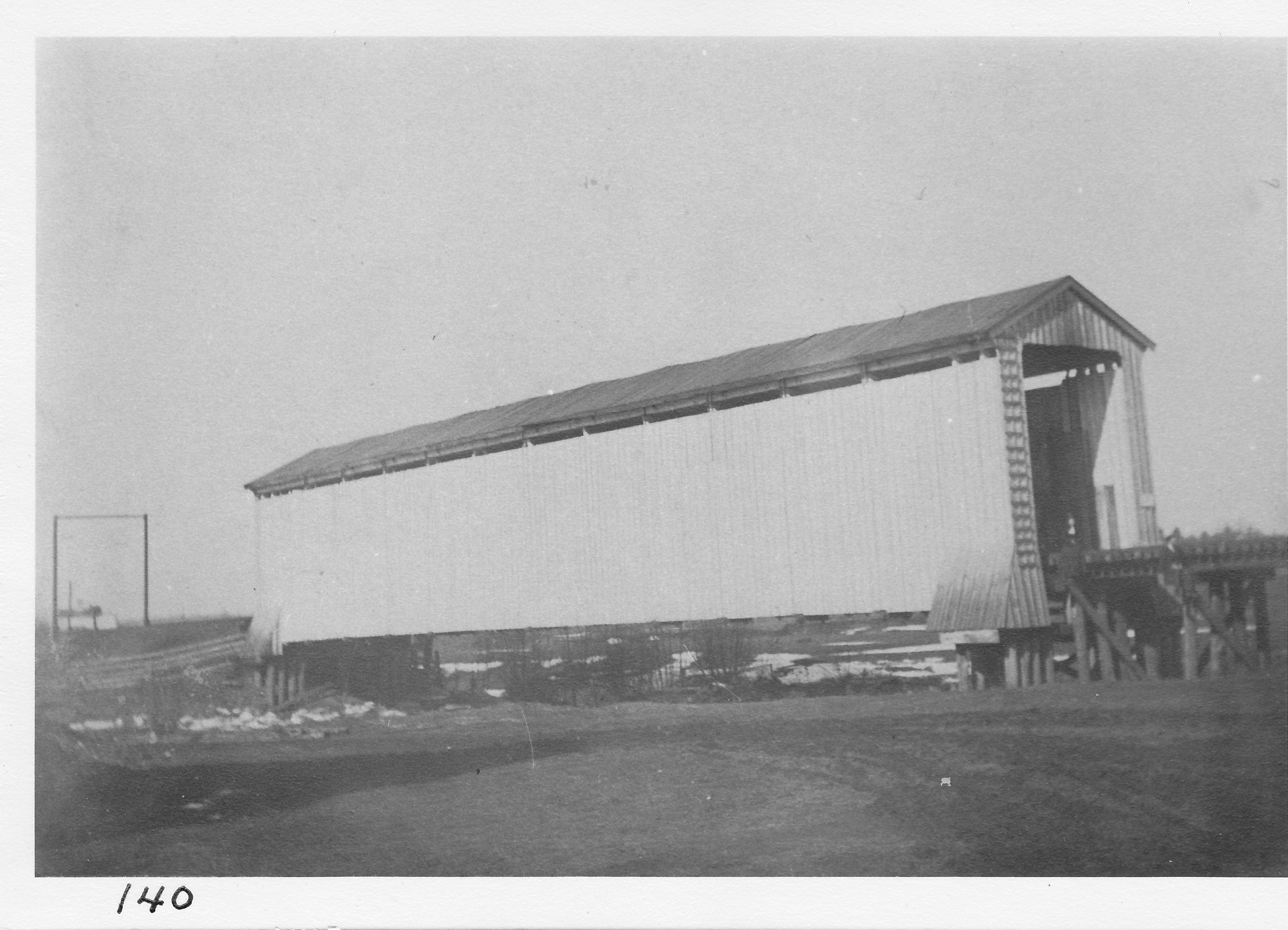 Lake shore & Michigan Southern Railway covered bridge over Bean Creek (Tiffin River) at foot of West Congress Street prior to 1908.