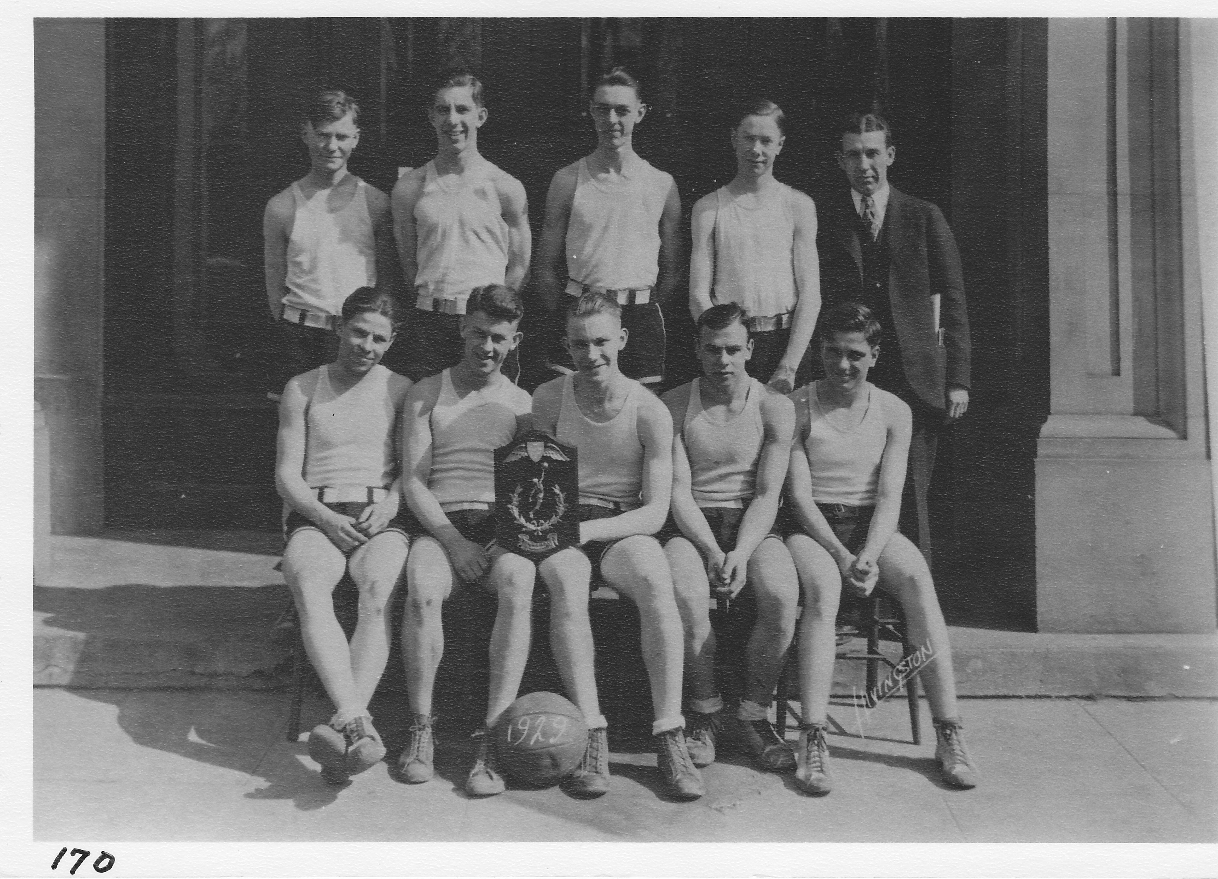Basketball Team of 1929.  Top row (l-r) Von Borton, L. Bancroft, G. Chappell, Dale Borton, Coach Rich.  Bottom (l-r) B. Siders, Bob Ackland, V. Baldwin, F. Eldridge, Ralph Mohler.
