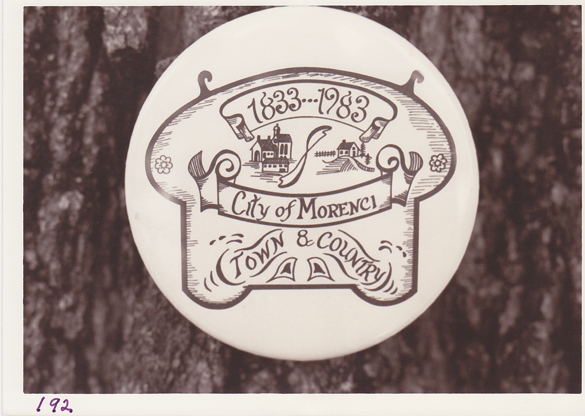 A photo view of Morenci Sesquicentennial logo adopted from a drawing by Christine Price Wood.