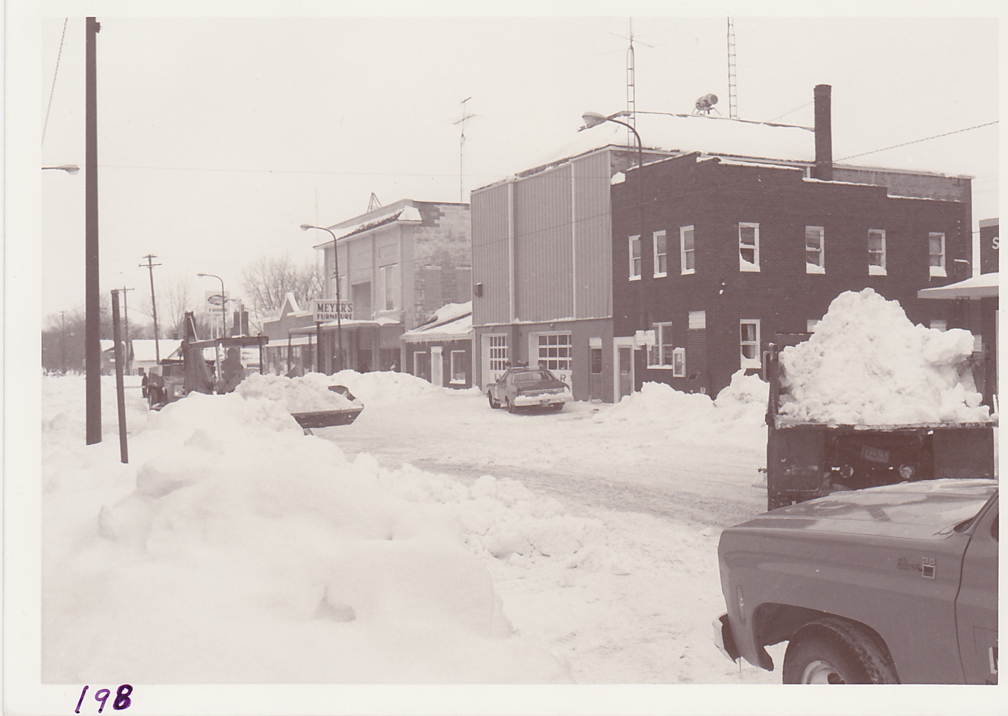 Following the storm, the City crew went right to work clearing Main Street for traffic convenience.