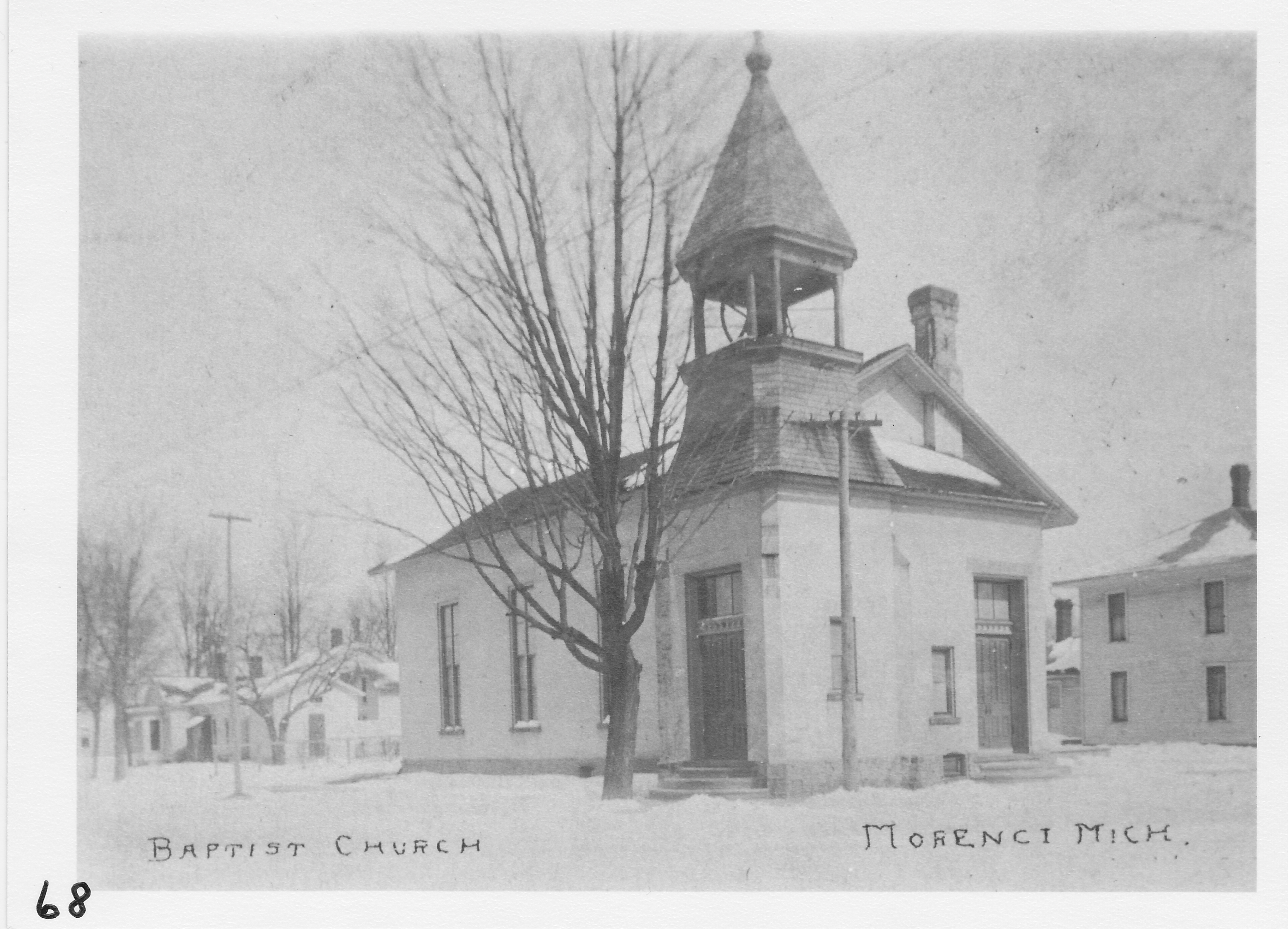 First Baptist Church at the northeast corner of Summit and Locust streets.  Parsonage at right.  West side and rear of J. P. Cawley house.  Built in 1852, razed in 1970.