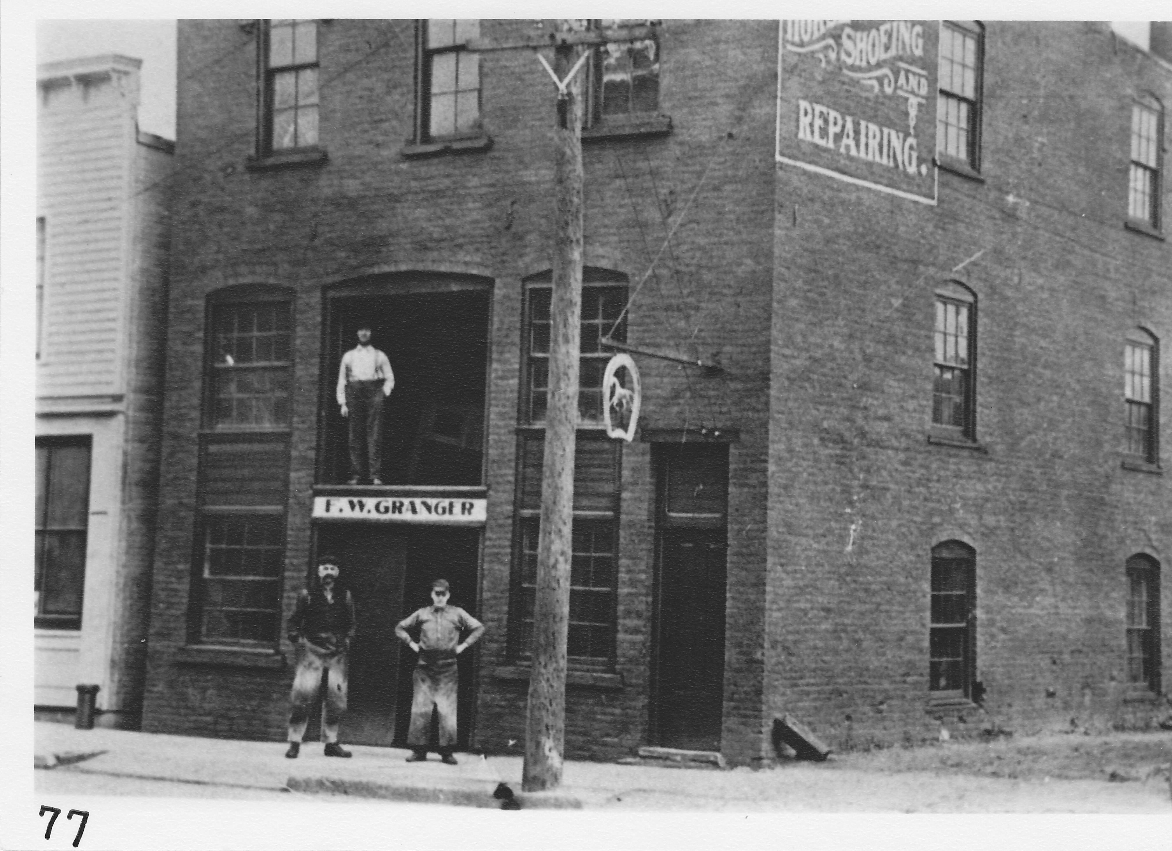 Frank Granger’s blacksmith shop on North Street at alley, east side, across from old I.O.O.F. Hall building (Dunbar Furniture and Auction).