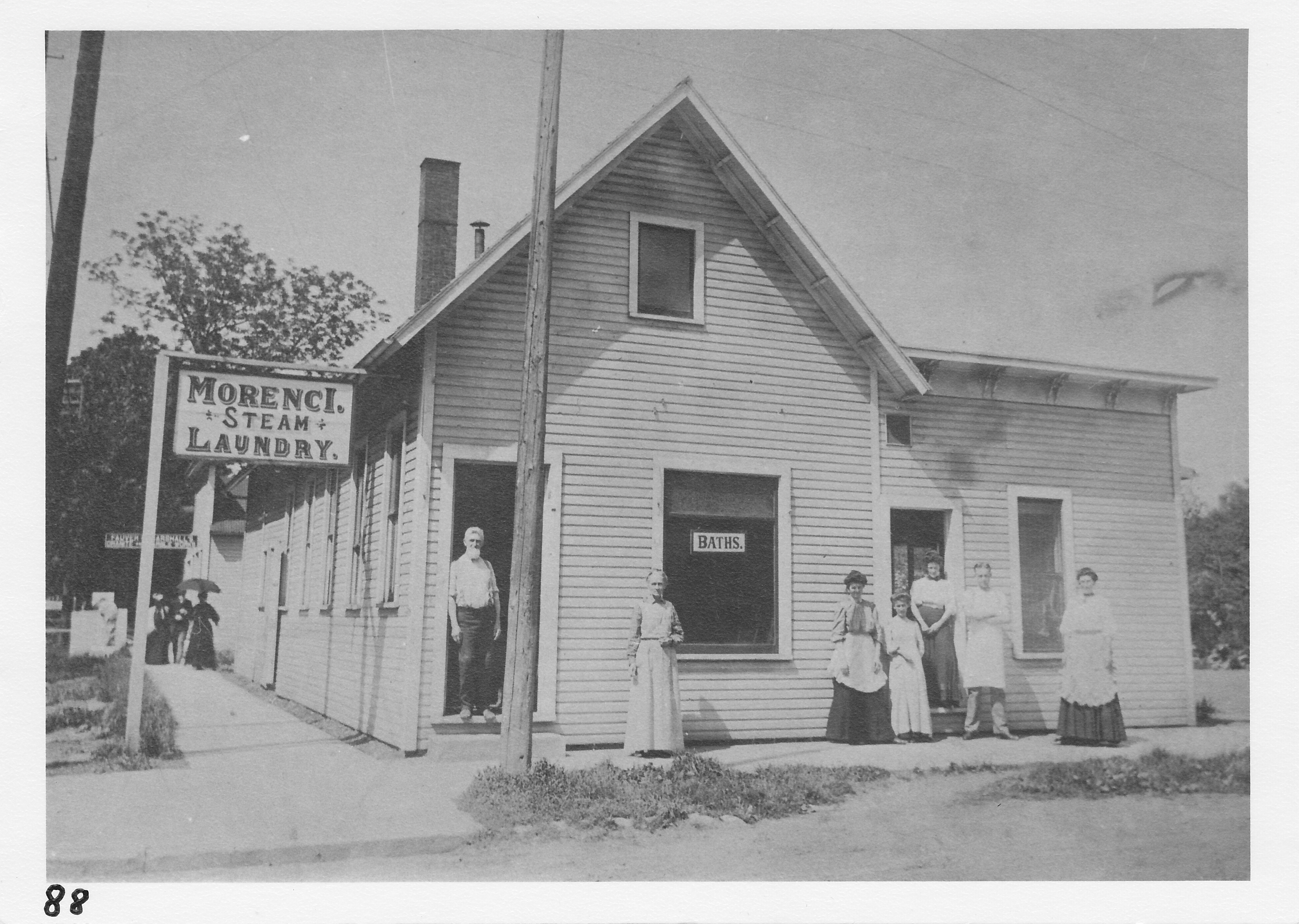 Morenci Steam Laundry, northeast corner of North and West Locust streets.  Mr. A. A. Abbott in doorway.  Burned Jan. 21, 1919.