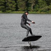 Staff member on Black Lake on his e-foil