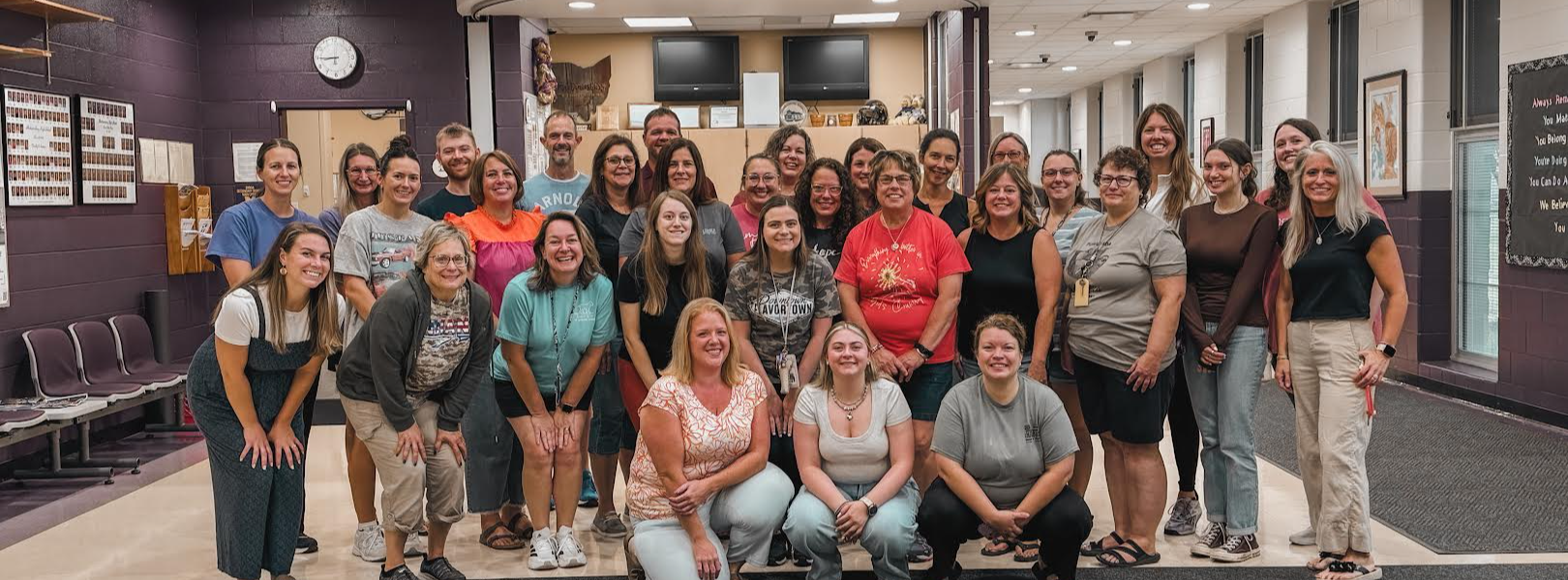 DWE Staff Picture in the High School lobby