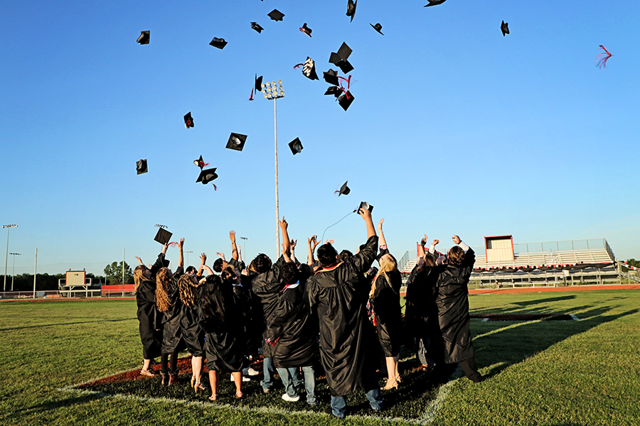 Trenton graduates tossing caps