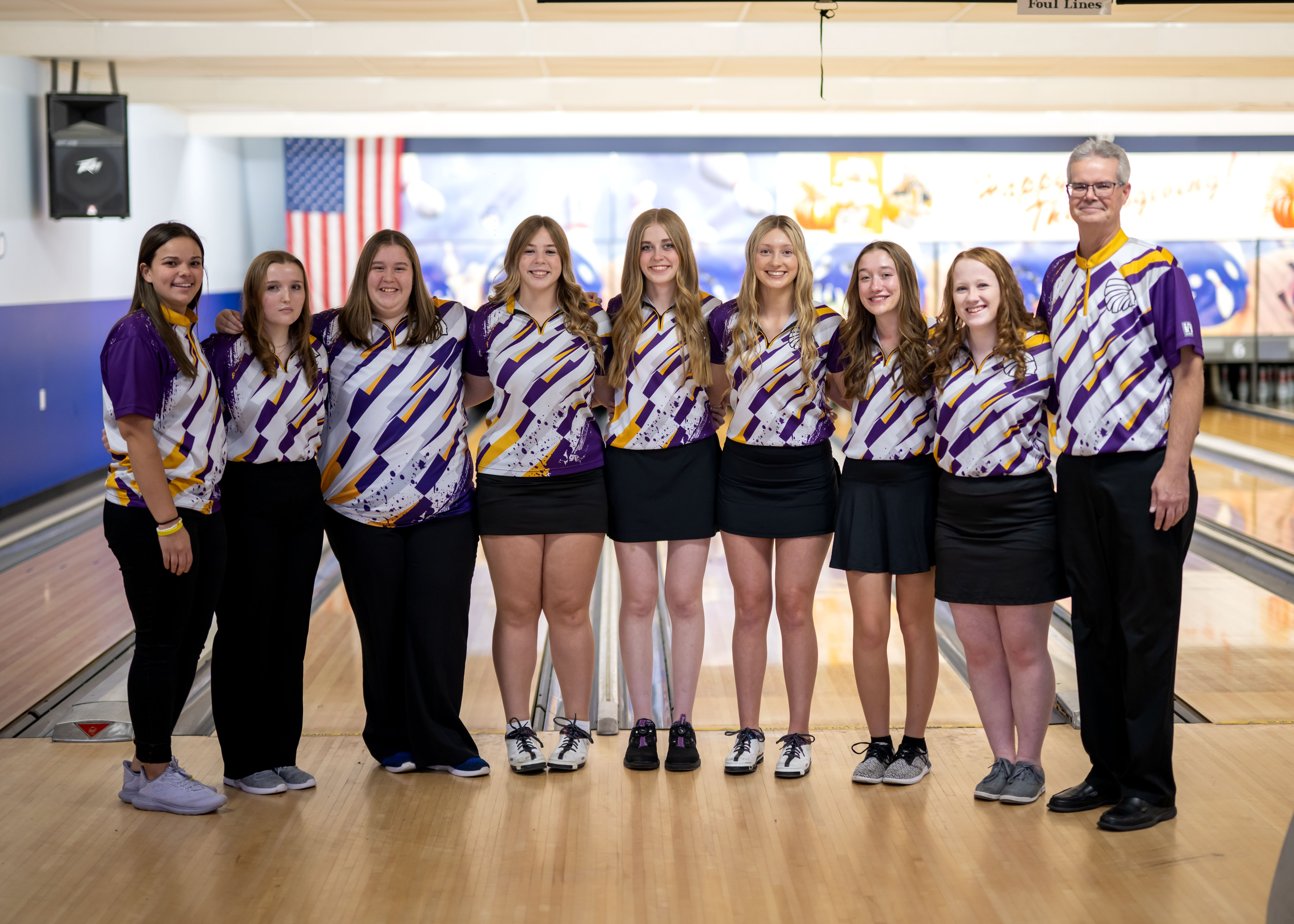 Girls Varsity Bowling Team With Coach
