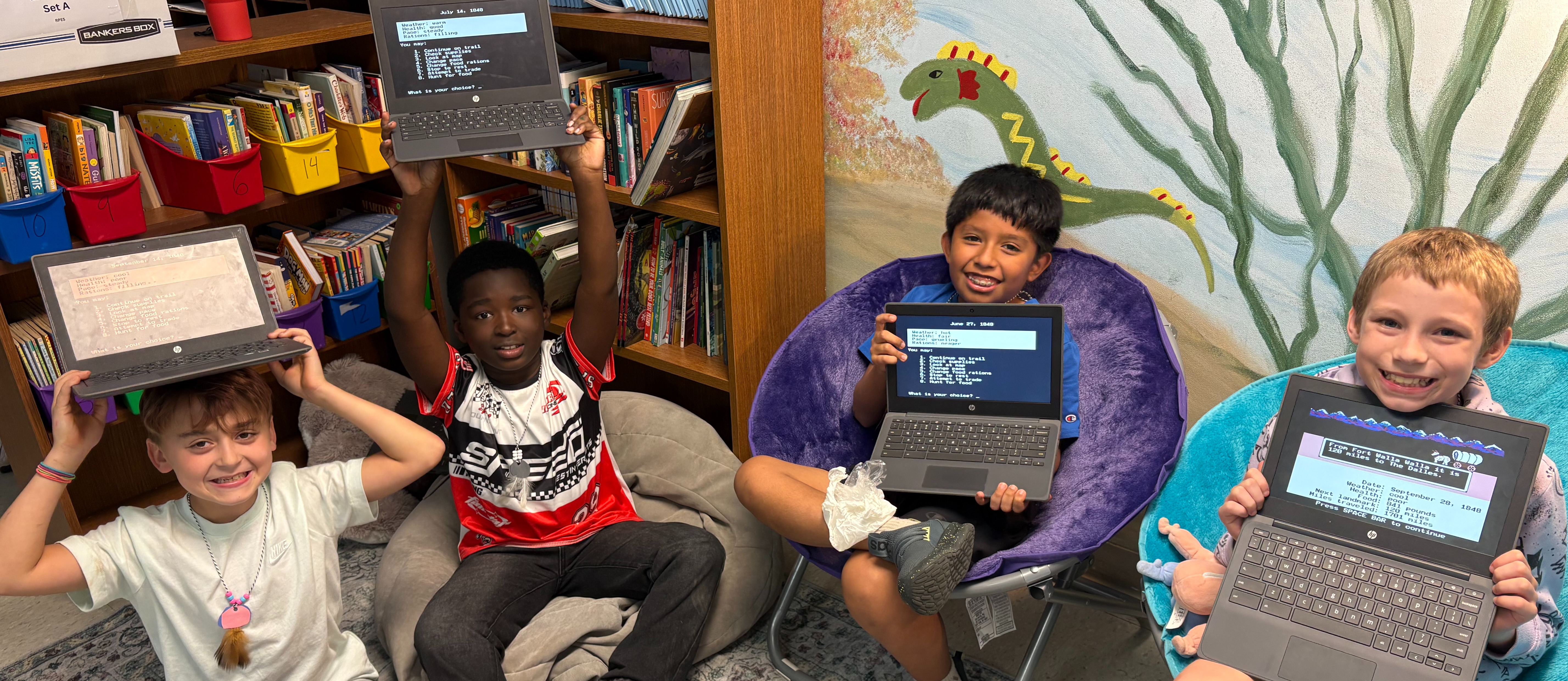 Students playing Oregon Trail