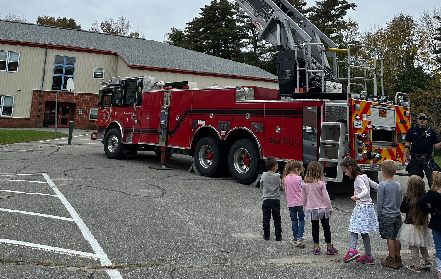 Fire truck and students