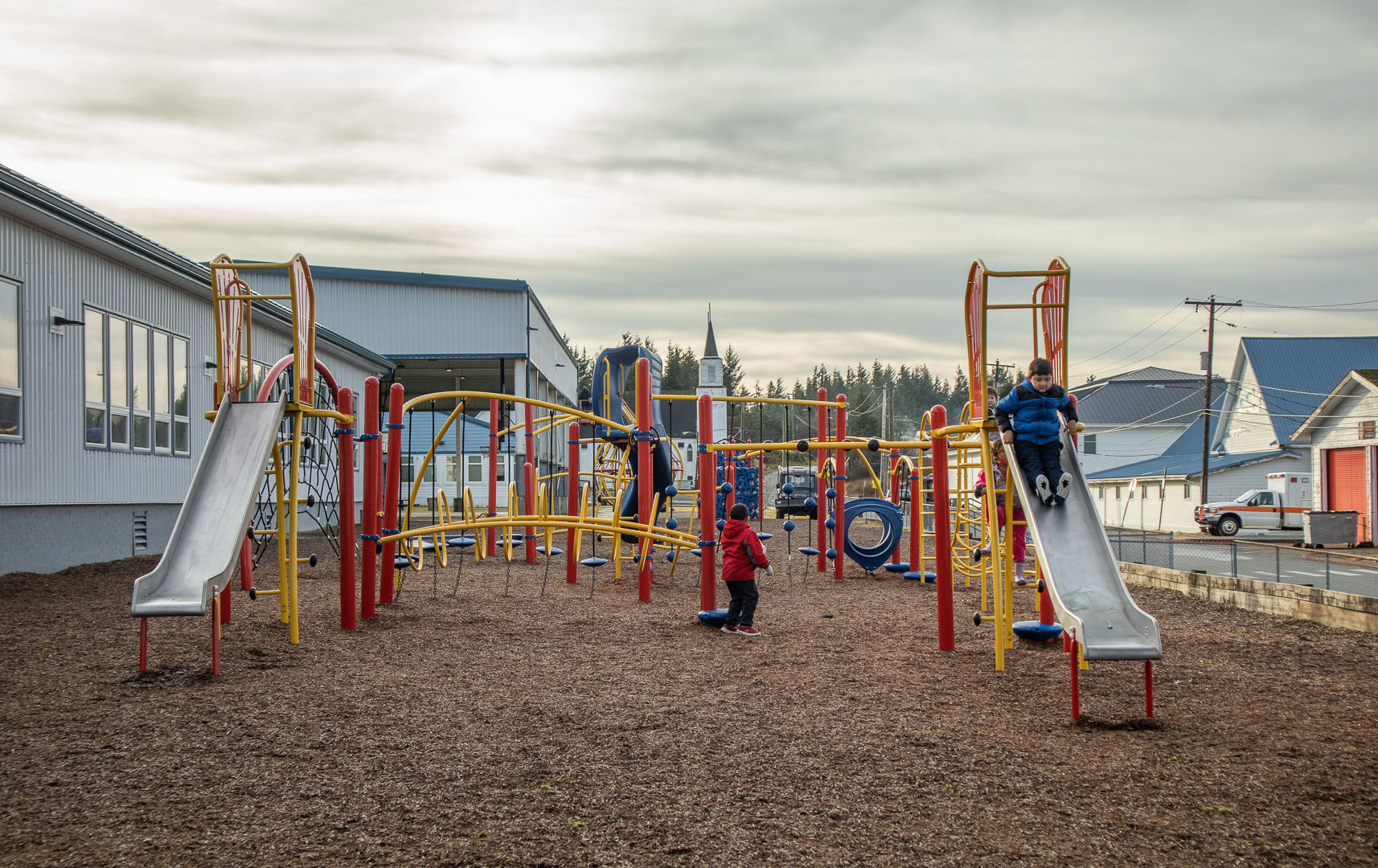 students playing on the playground at RJ Elementary