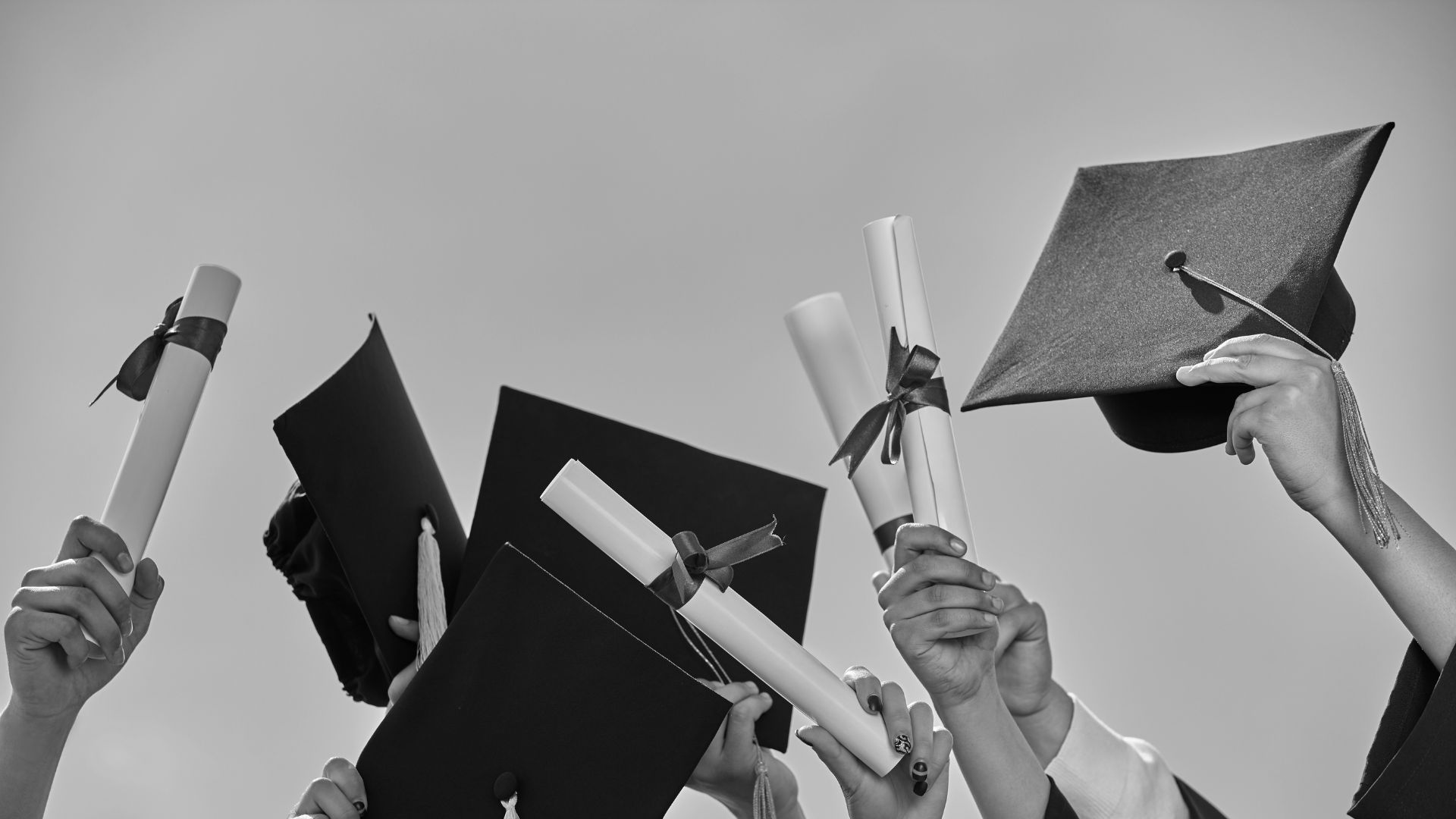 graduation caps and diplomas