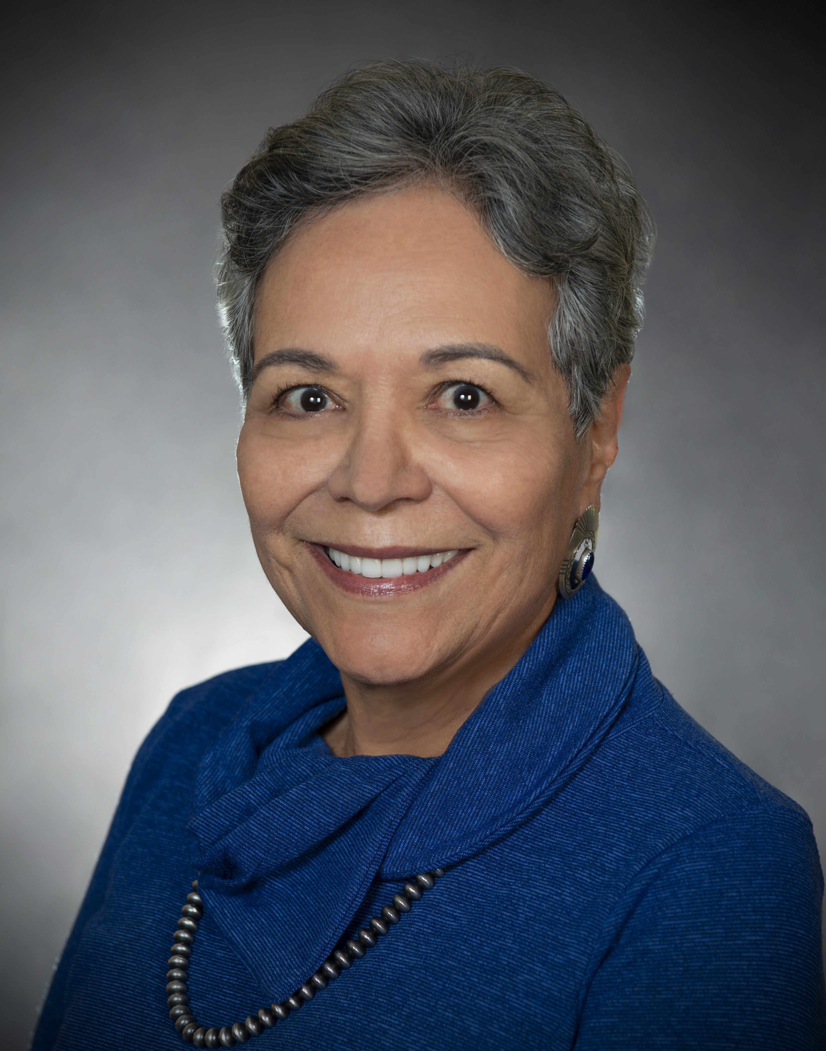Dr. Carmen L. Gonzales, Member