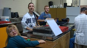 BGLC students working in the papermaking room.