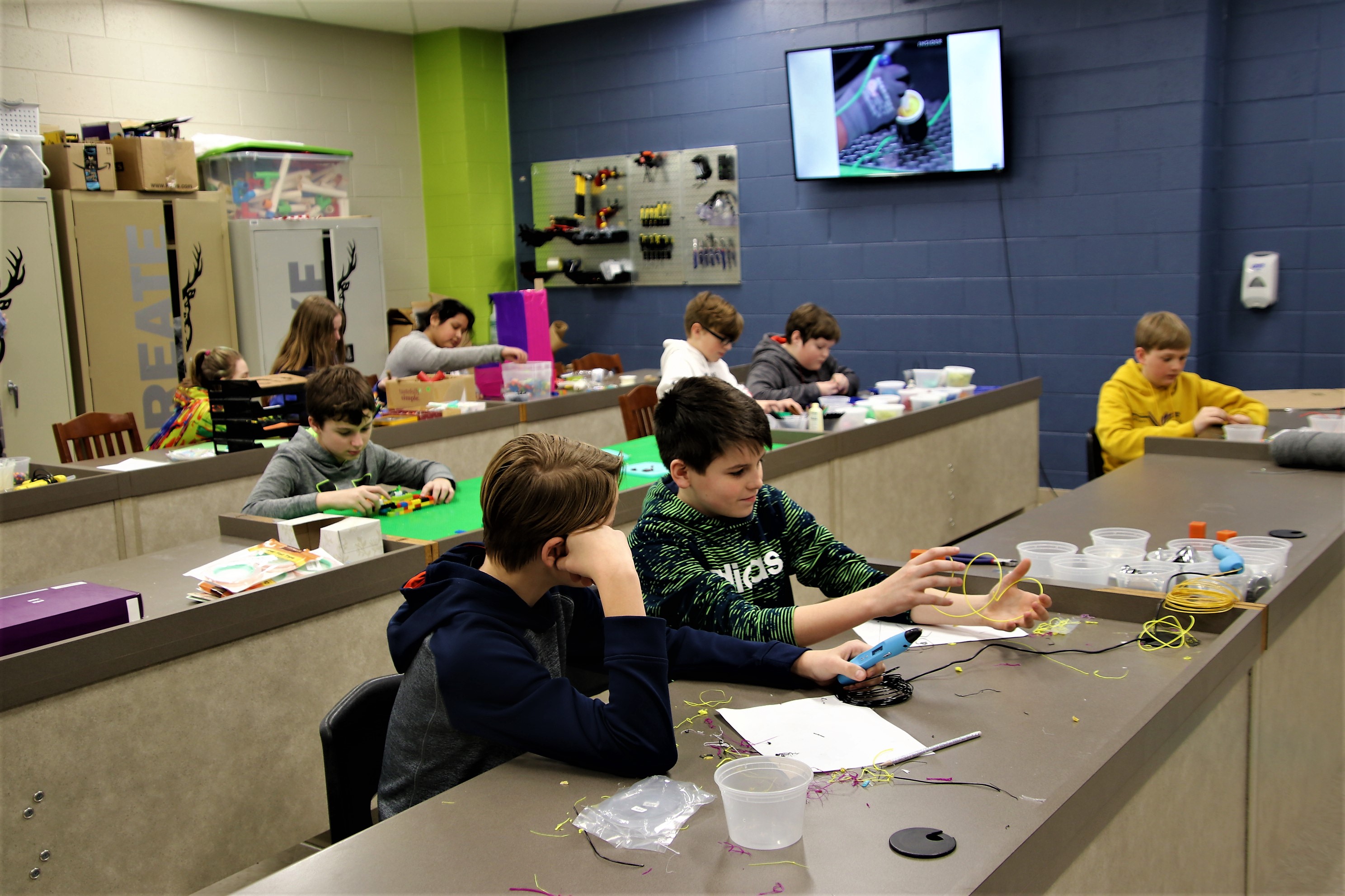 Middle School students working in maker-space