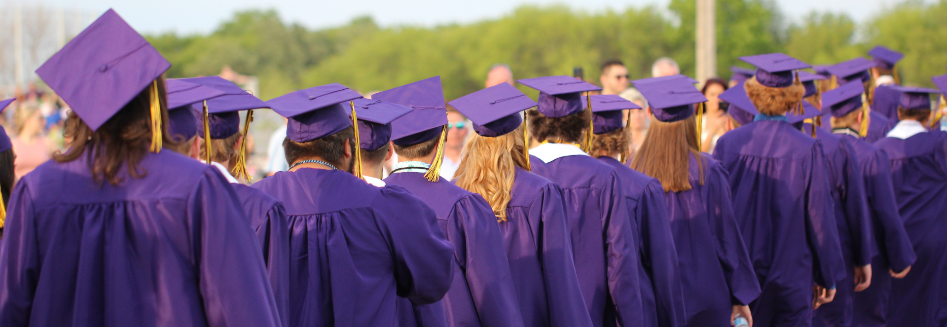 Elkhorn Graduates in cap and gown