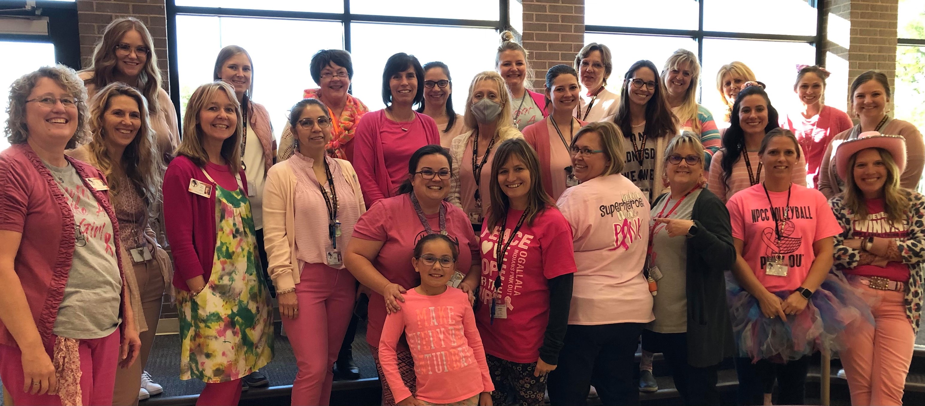 teachers posing in pink