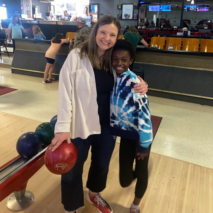 student and teacher bowling