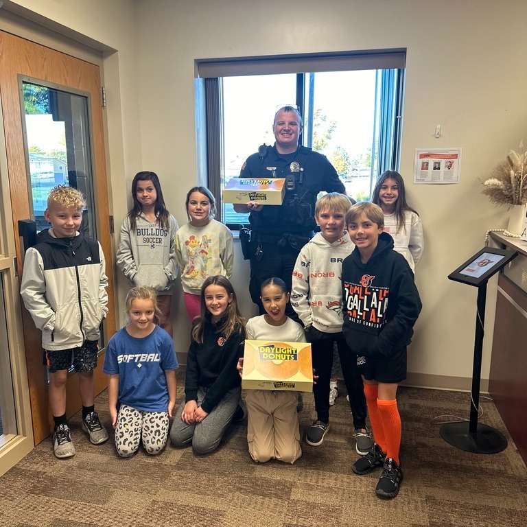 students with police officer