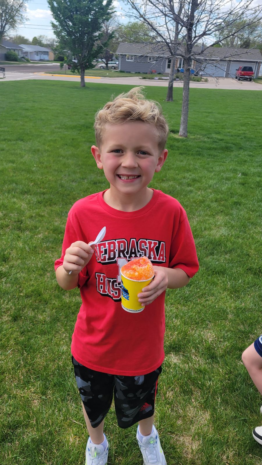 student with snowcone