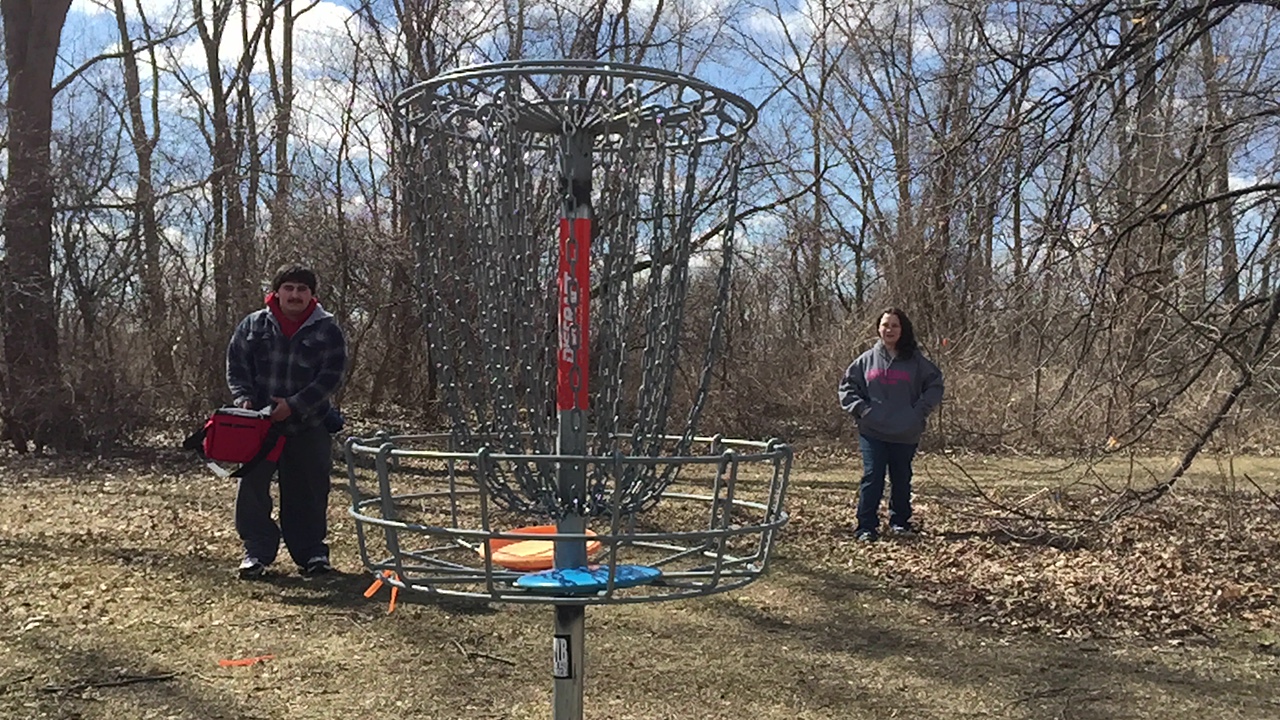 photo of Disc Golf Club members in action
