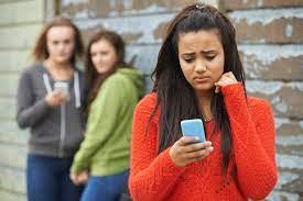 bad news on a cell phone or bullying text picture
