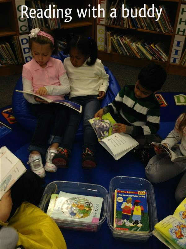 photo of students reading with a buddy