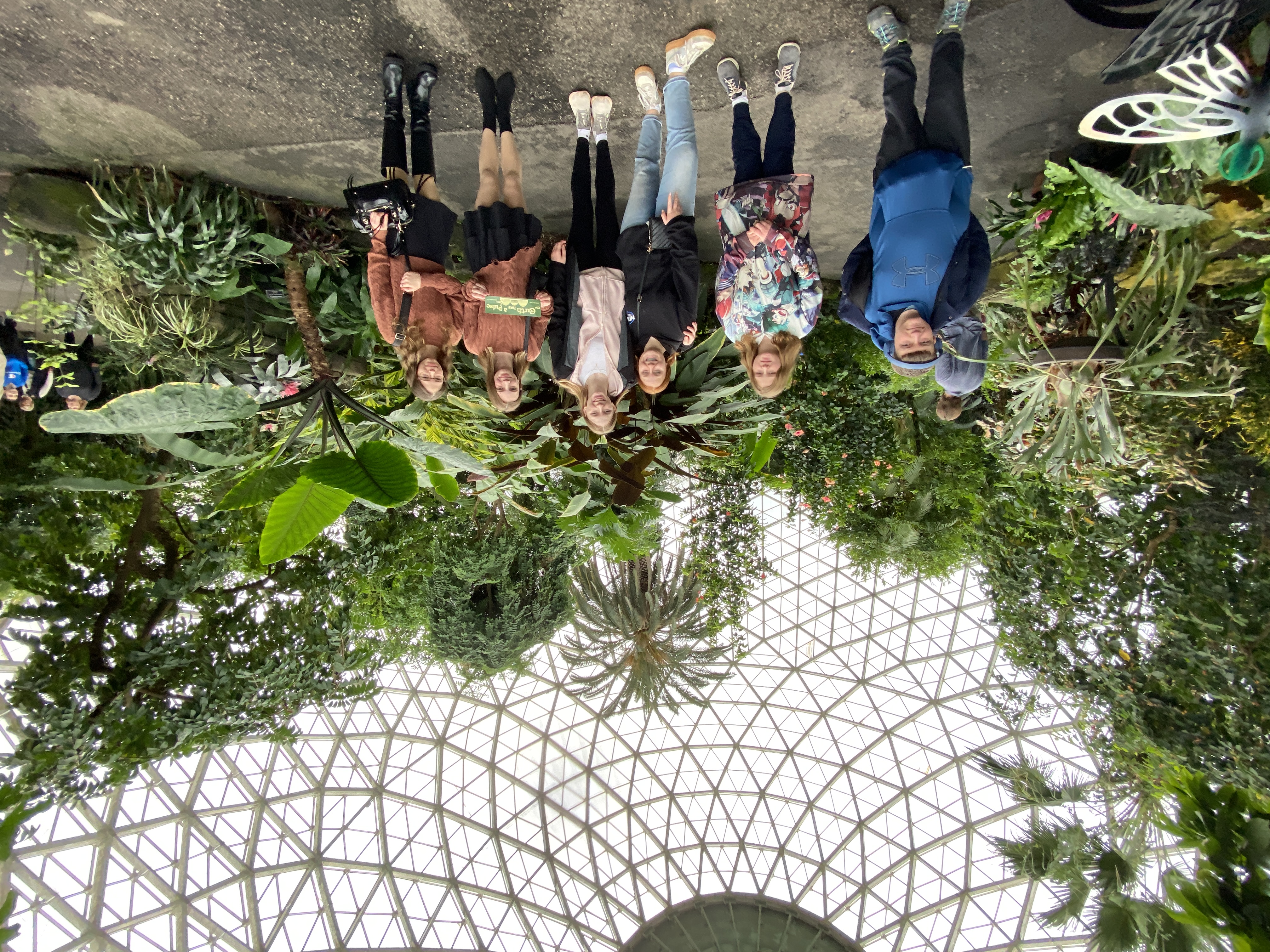plants and people in a dome