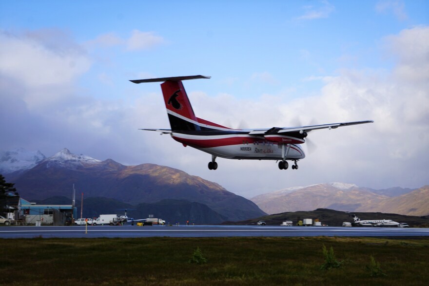 Ravn airplane with mountains in the background