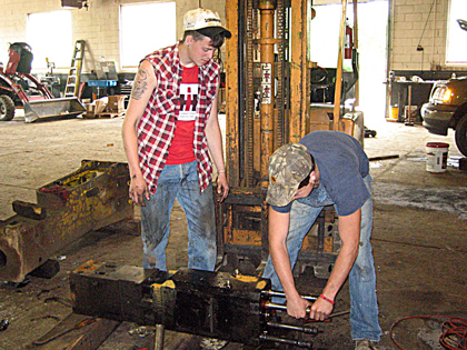 Two Diesel Technology Program students worked as interns at Monroe Tractor in Horseheads.  