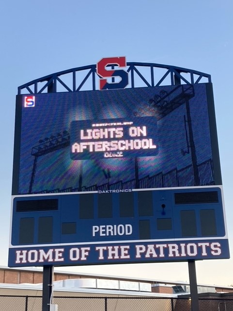 The SHS scoreboard lit up for Lights on Afterschool