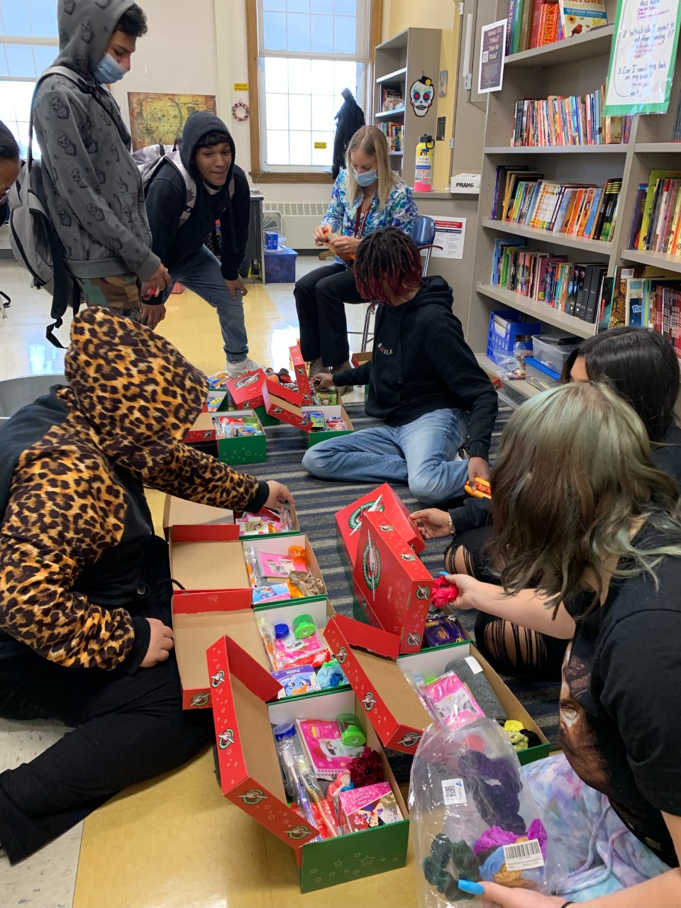 Photo:  8th graders at Mont Pleasant assembling donations for Operation Christmas Child