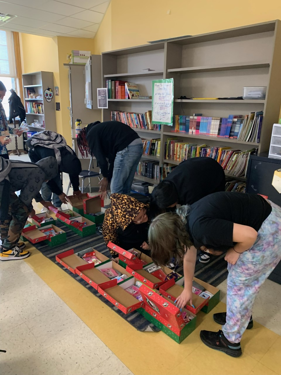 Photo:  8th graders at Mont Pleasant assembling donations for Operation Christmas Child