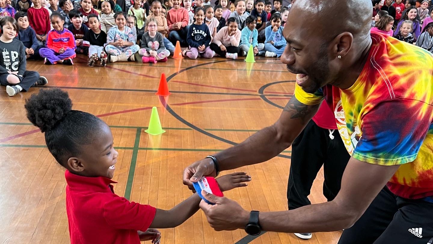 Photo:  Basketball Player Tay Fisher visits Paige