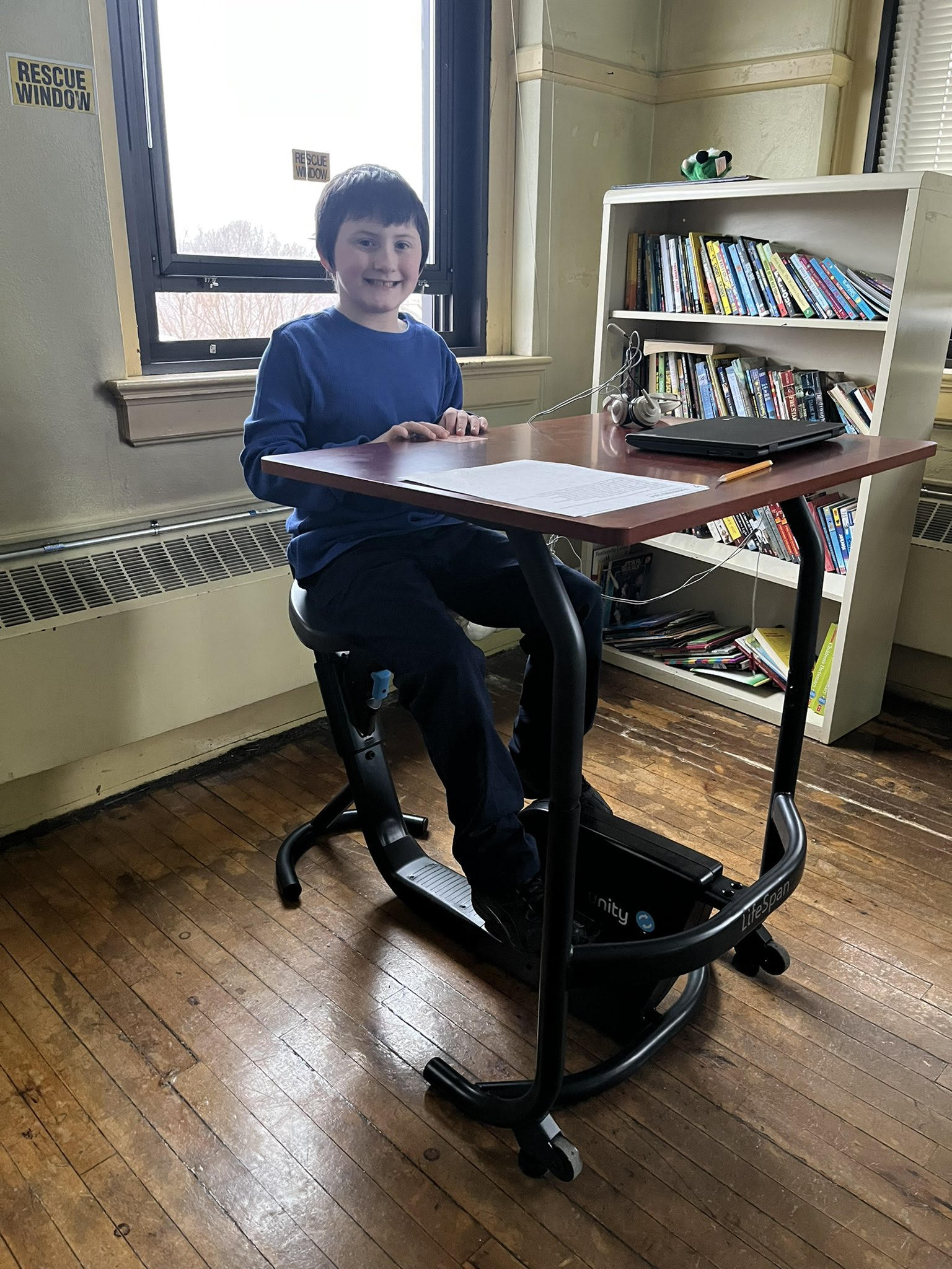 Photo: Students at Washington Irving were excited to try out their brand new pedal desks. The desk is great for physical activity and involves more senses in learning.